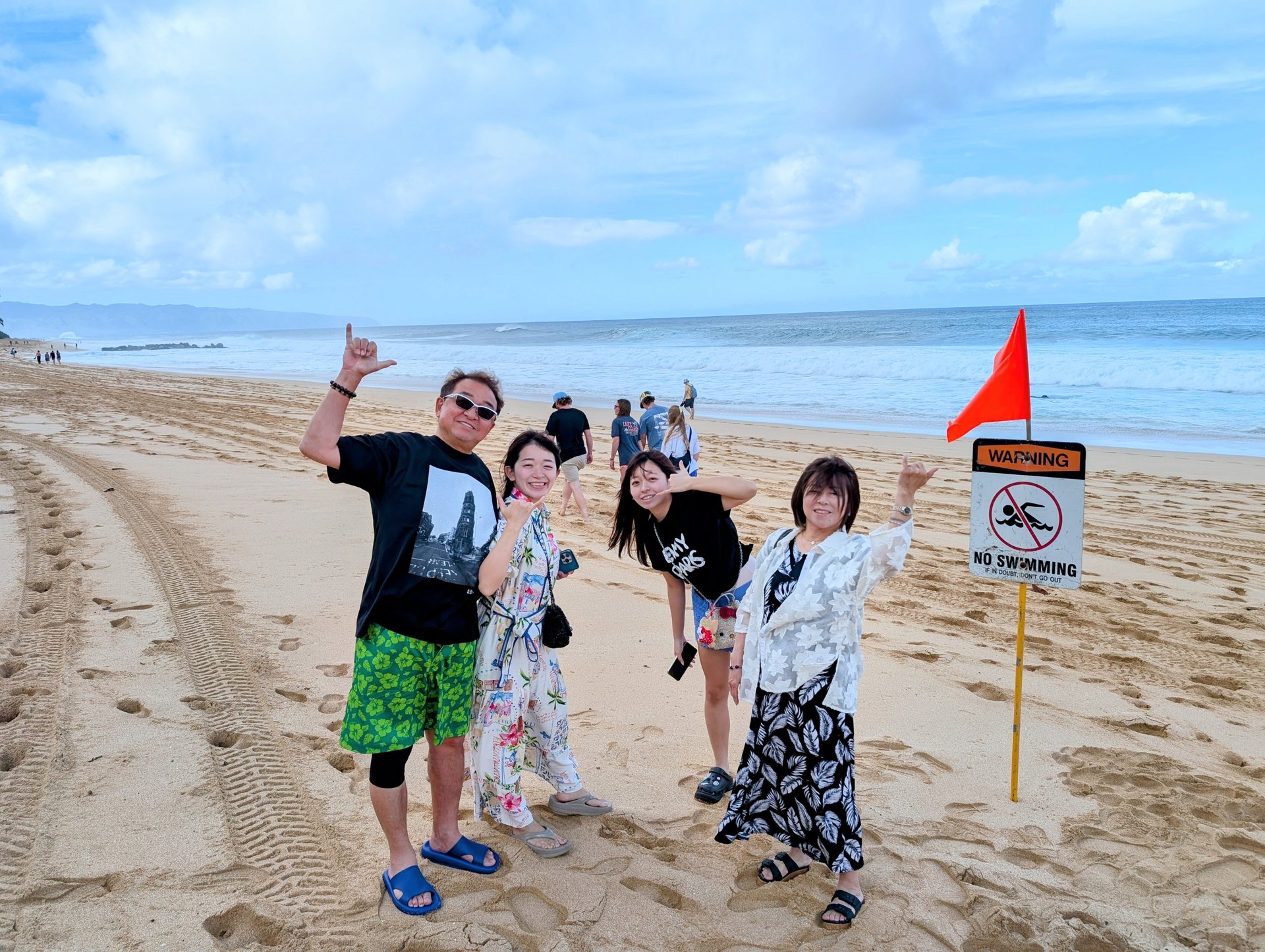 ノースショアのビーチで過ごすお客様